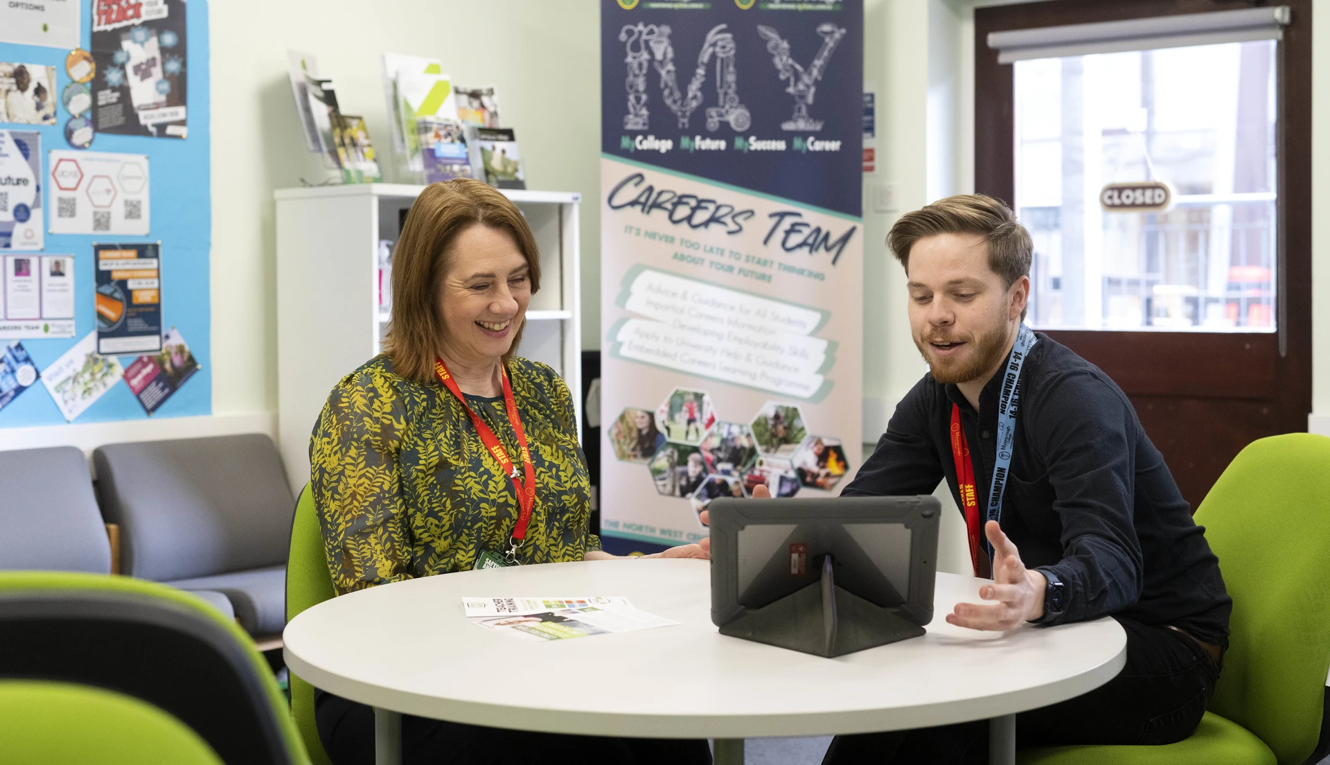 Two Myerscough College members of staff in the careers zone